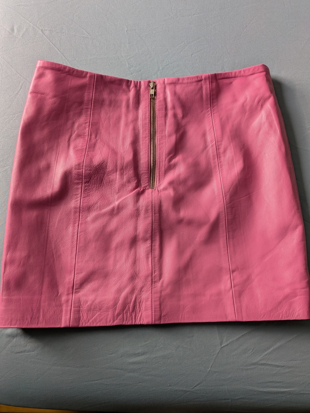 Pink Leather Mini Skirt with Center Zip,never use ,new .